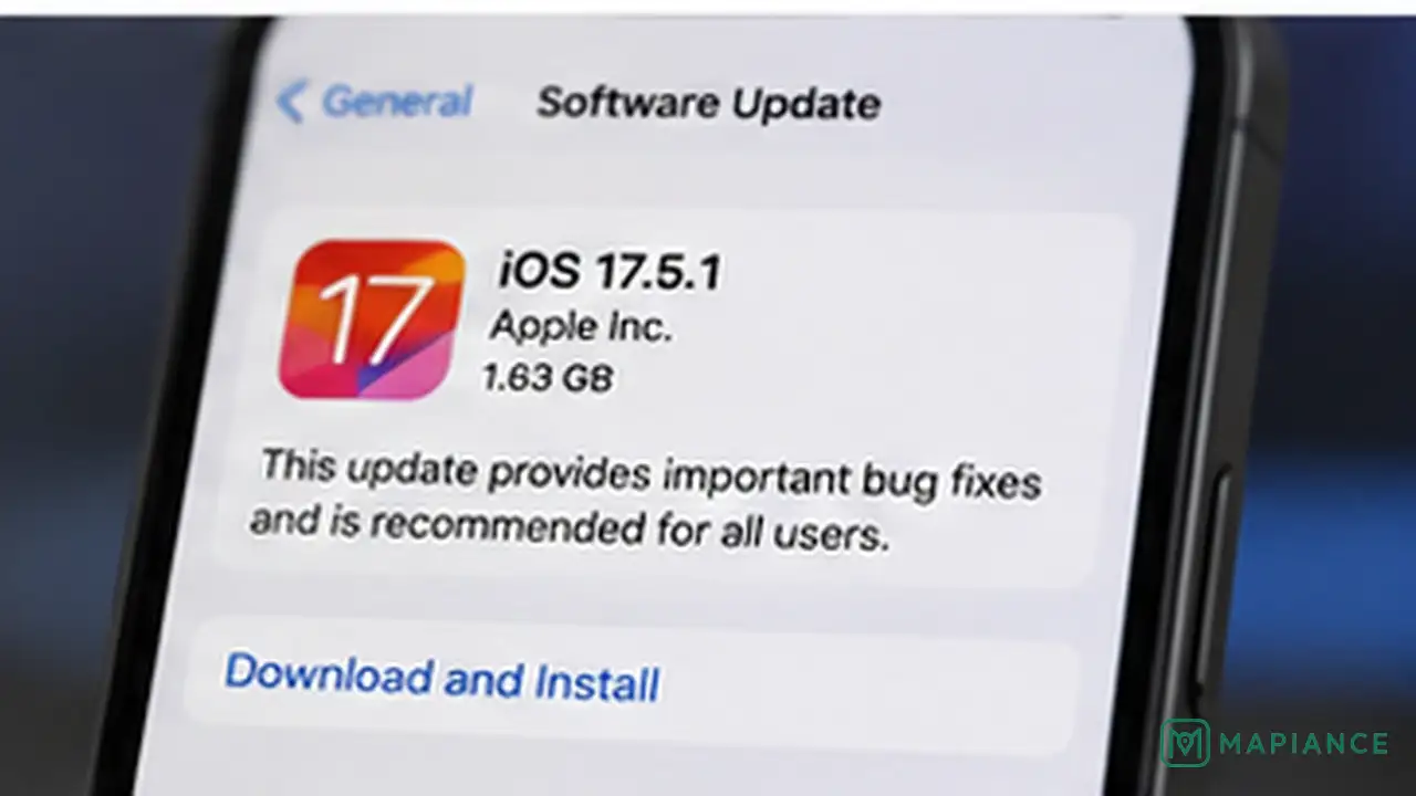 iPhone installing a software update with a computer nearby as an alternative update method.