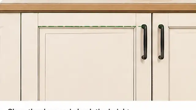 Person checking two cabinet doors with aligned top edges and even gaps after hinge adjustment.
