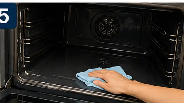 Person cleaning oven racks and wiping the oven door glass while avoiding the door gasket.