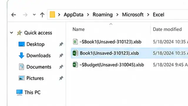 Person comparing an original Excel workbook with a recently recovered unsaved version.