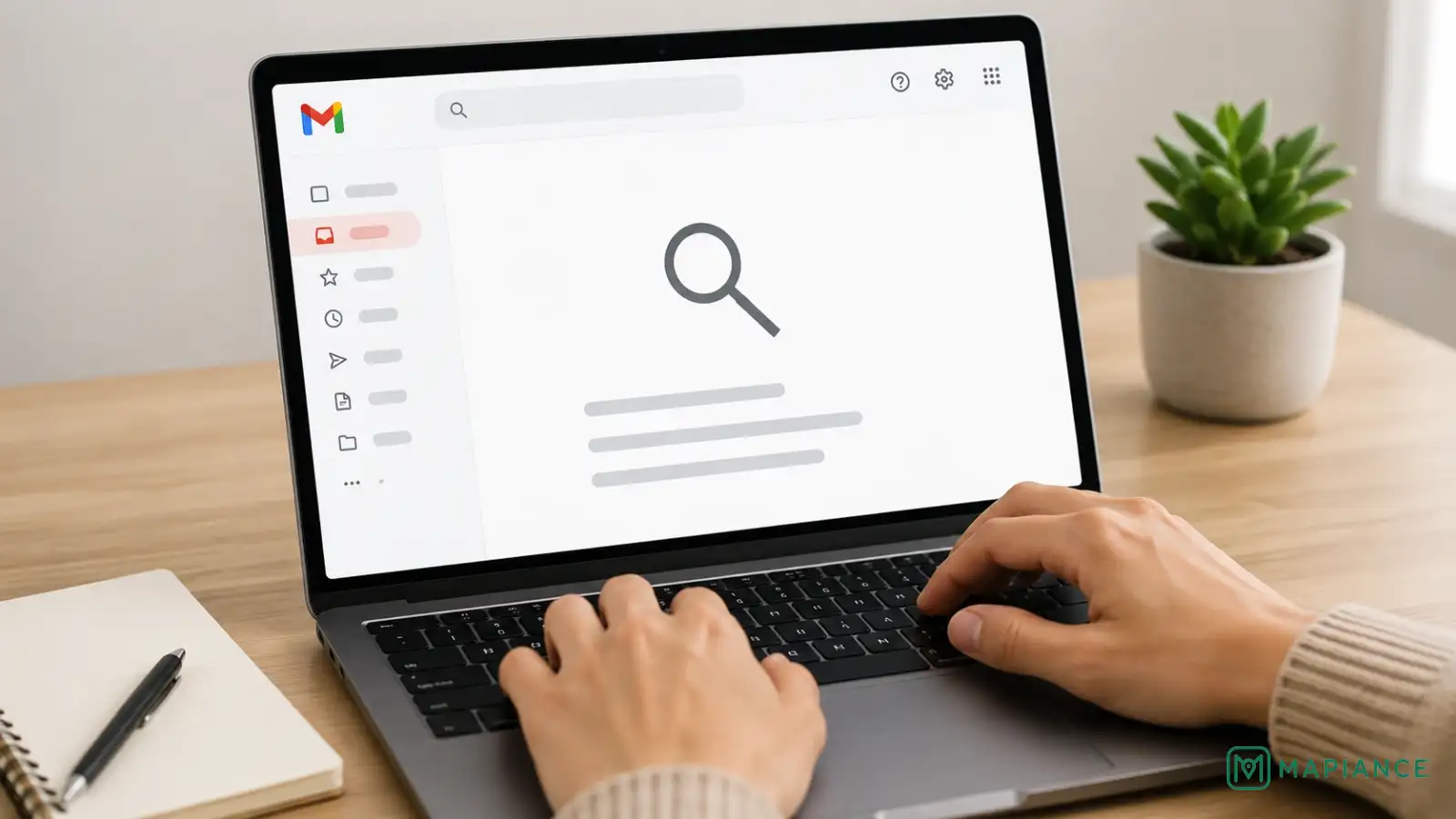 Person searching Gmail for a missing email on a laptop.