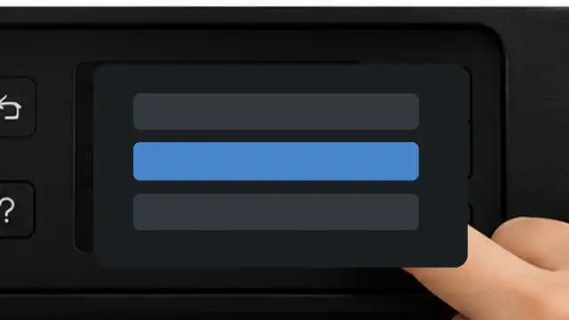 Person updating printer software and reconnecting a wireless printer to Wi-Fi.